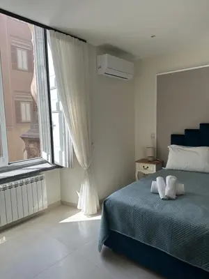 Letto o letti in una camera di Obelisco di San Gennaro