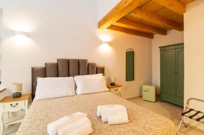 Letto o letti in una camera di Obelisco di San Gennaro