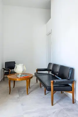 Area soggiorno di Holme Relais Santa Lucia by NapoliApartments