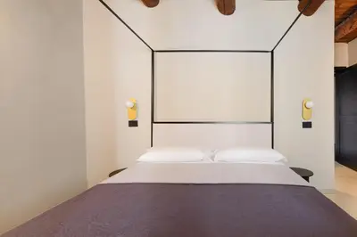 Letto o letti in una camera di The Neapolitan BB Palazzo Carafa della Spina