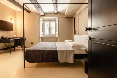 Letto o letti in una camera di The Neapolitan BB Palazzo Carafa della Spina
