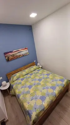 Letto o letti in una camera di Holiday House Siren Parthenos