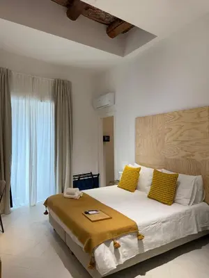 Letto o letti in una camera di Tresette Porta Capuana