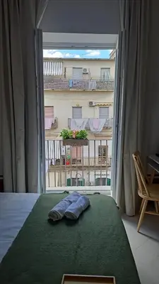 Letto o letti in una camera di Tresette Porta Capuana