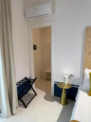 Letto o letti in una camera di Tresette Porta Capuana