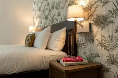 Letto o letti in una camera di Riviera Collection - Rooms and Suites