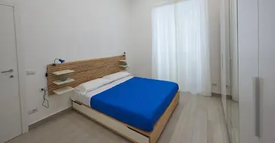 Letto o letti in una camera di La Dimora Napoli Vomero