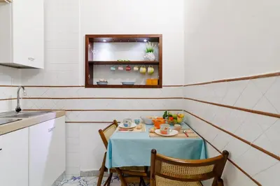 Cucina o angolo cottura di Plebiscito Apartment by Ele