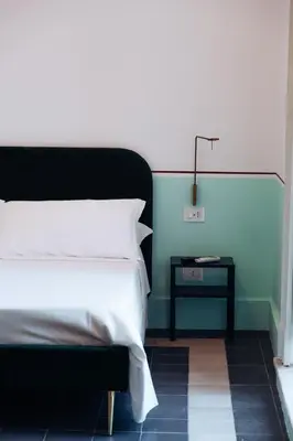 Letto o letti in una camera di Altoledo Rooms and Suite