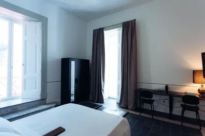 Letto o letti in una camera di Altoledo Rooms and Suite