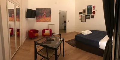 Letto o letti in una camera di La Galleria
