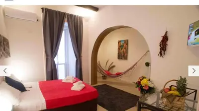 Letto o letti in una camera di La Galleria