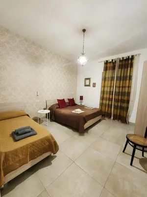 Letto o letti in una camera di Casa Murales 60