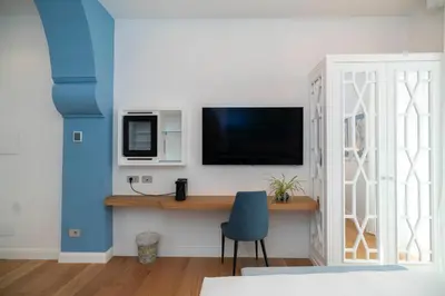 TV o dispositivi per l'intrattenimento presso 4ROOMS Naples