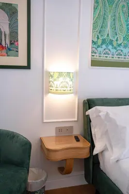 Letto o letti in una camera di 4ROOMS Naples