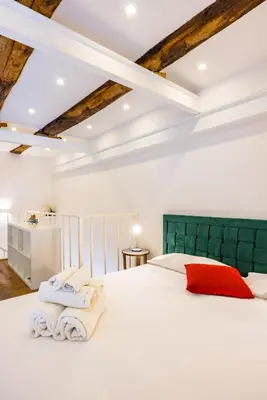 Letto o letti in una camera di Toledo Heights by NapoliApartments