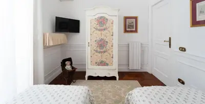 Letto o letti in una camera di Derah Ari- Via Carlo Poerio,98