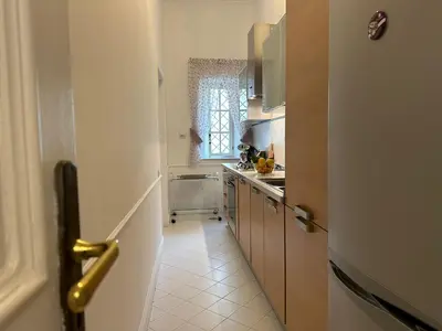 Cucina o angolo cottura di Derah Ari- Via Carlo Poerio,98