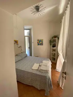 Letto o letti in una camera di La Piazzetta