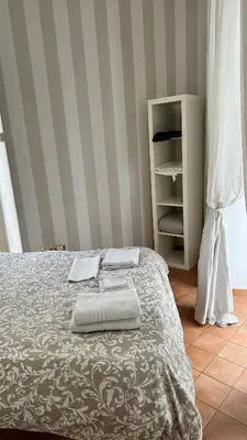 Letto o letti in una camera di La Piazzetta