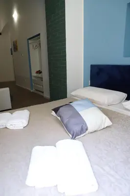 Letto o letti in una camera di Partenope's Rooms
