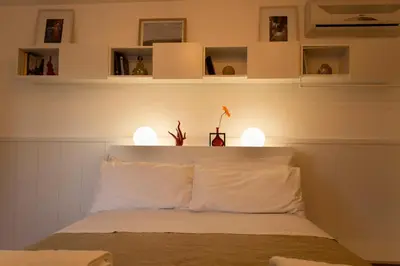 Letto o letti in una camera di Sui Tetti di Napoli