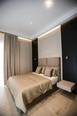Letto o letti in una camera di LUNA Gallery Suites