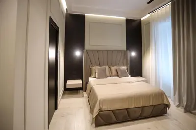 Letto o letti in una camera di LUNA Gallery Suites