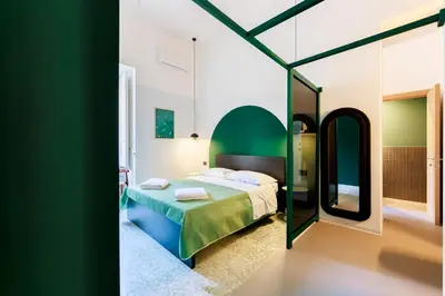 Letto o letti in una camera di Assoli House