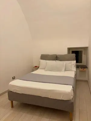 Letto o letti in una camera di Domus Gazzara -Napoli Centro Storico