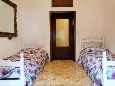 Letto o letti in una camera di NONNAElisa