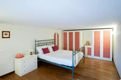 Letto o letti in una camera di Casa Regina