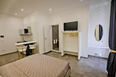 TV o dispositivi per l'intrattenimento presso Dante Luxury Rooms