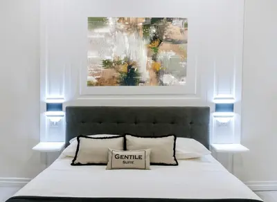 Letto o letti in una camera di Gentile Suite Decumani