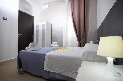 Letto o letti in una camera di Napolì 2 Affittacamere
