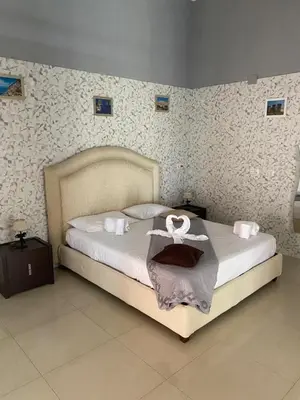 Letto o letti in una camera di Dimora Melania