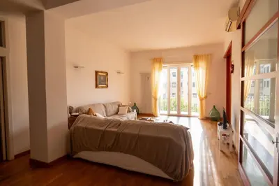 Letto o letti in una camera di Dimora Santacroce