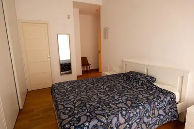 Letto o letti in una camera di Dimora Santacroce