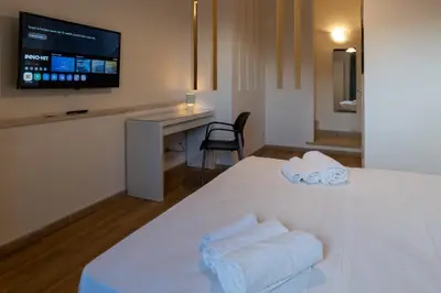 Letto o letti in una camera di Terrazza Duomo