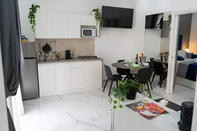 Cucina o angolo cottura di Scugnizzo Apartment SMART