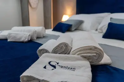 Letto o letti in una camera di Scugnizzo Apartment SMART