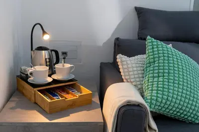 Area soggiorno di Scugnizzo Apartment SMART