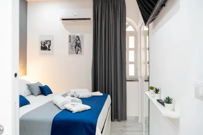 Letto o letti in una camera di Scugnizzo Apartment SMART