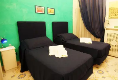 Letto o letti in una camera di Le Vie Di Napoli B&B