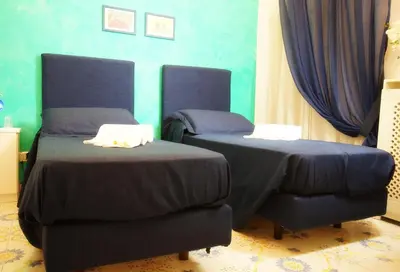 Letto o letti in una camera di Le Vie Di Napoli B&B