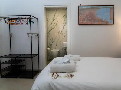 Letto o letti in una camera di B&B Marinella