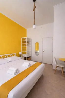 Letto o letti in una camera di B&B Napoli Tonic