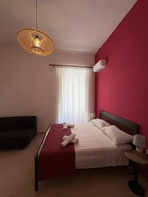 Letto o letti in una camera di B&B Napoli Tonic