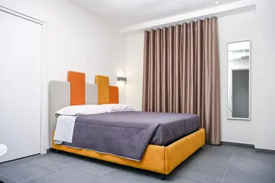 Letto o letti in una camera di 1811 Palace