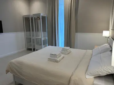 Letto o letti in una camera di Terrazza Carbonara B&B